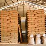 coffee bean sacks stacked warehouse