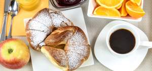 Table-Lay-Flatlay-Breakfast-coffee-pastries-pastry-orange-fresh-juice-apple-cutlery-yellow-valentines-day-february